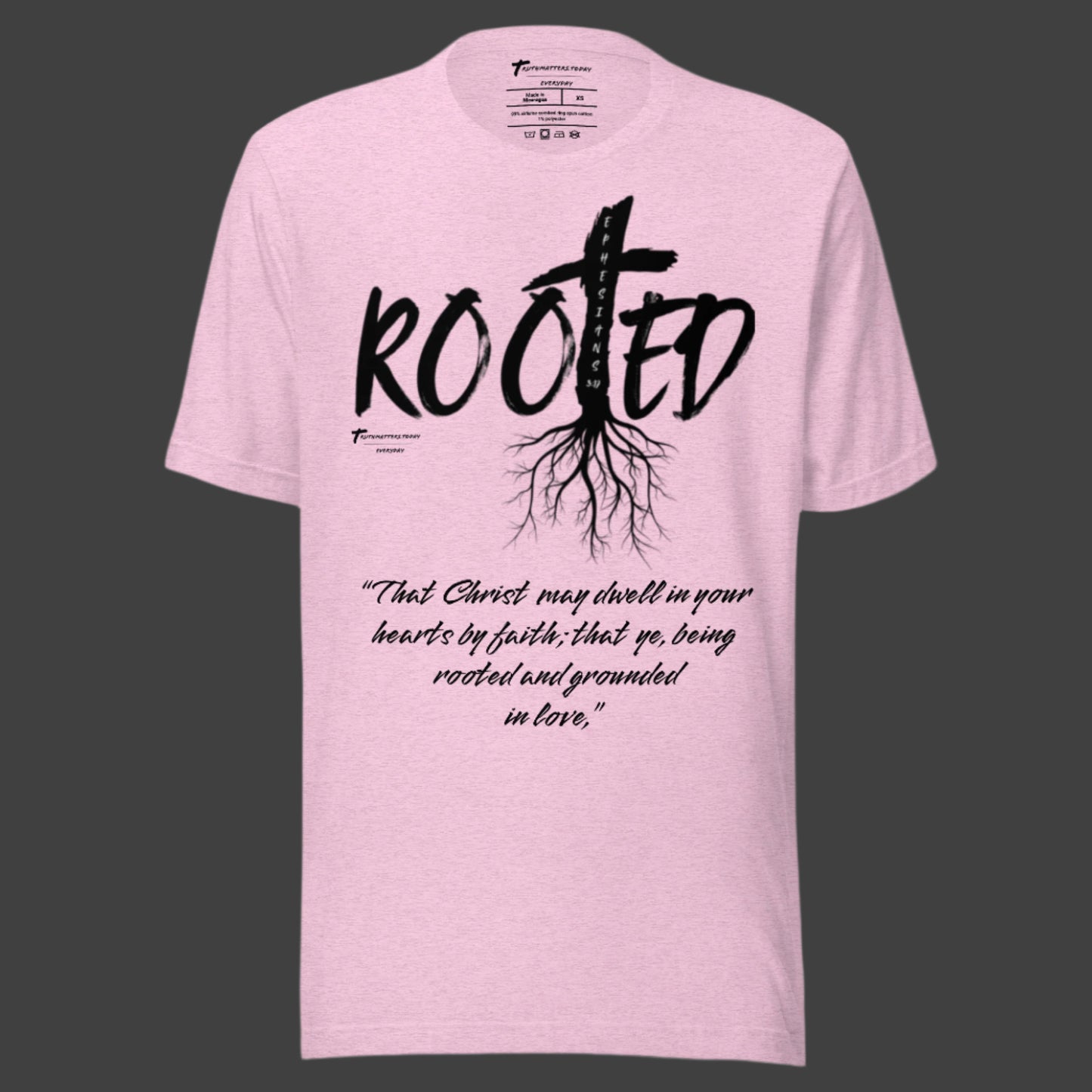 Truth Matters’ Rooted T-Shirt front with cross in ‘ROOTED’ and Ephesians 3:17 KJV on soft cotton in heather lilac.