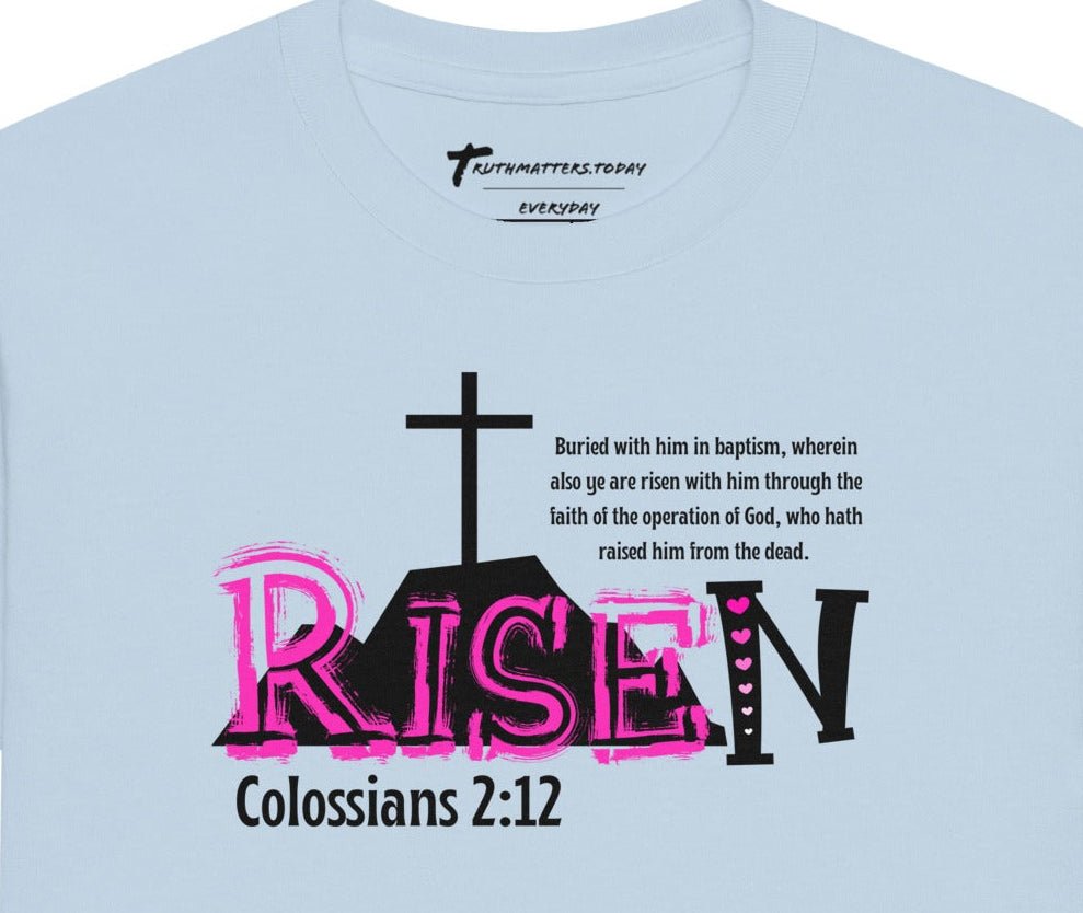 Close-up detail of bold RISEN with pink hearts on N and full KJV Colossians 2:12 verse on classic cotton youth shirt