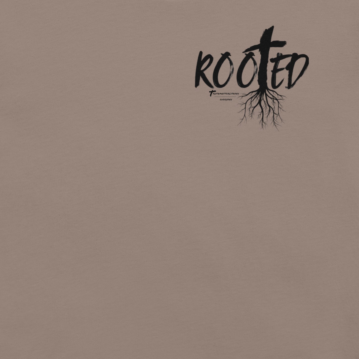 Front of Rooted Christian t-shirt in pebble with cross and tree roots design and Colossians 2:6-7 scripture.