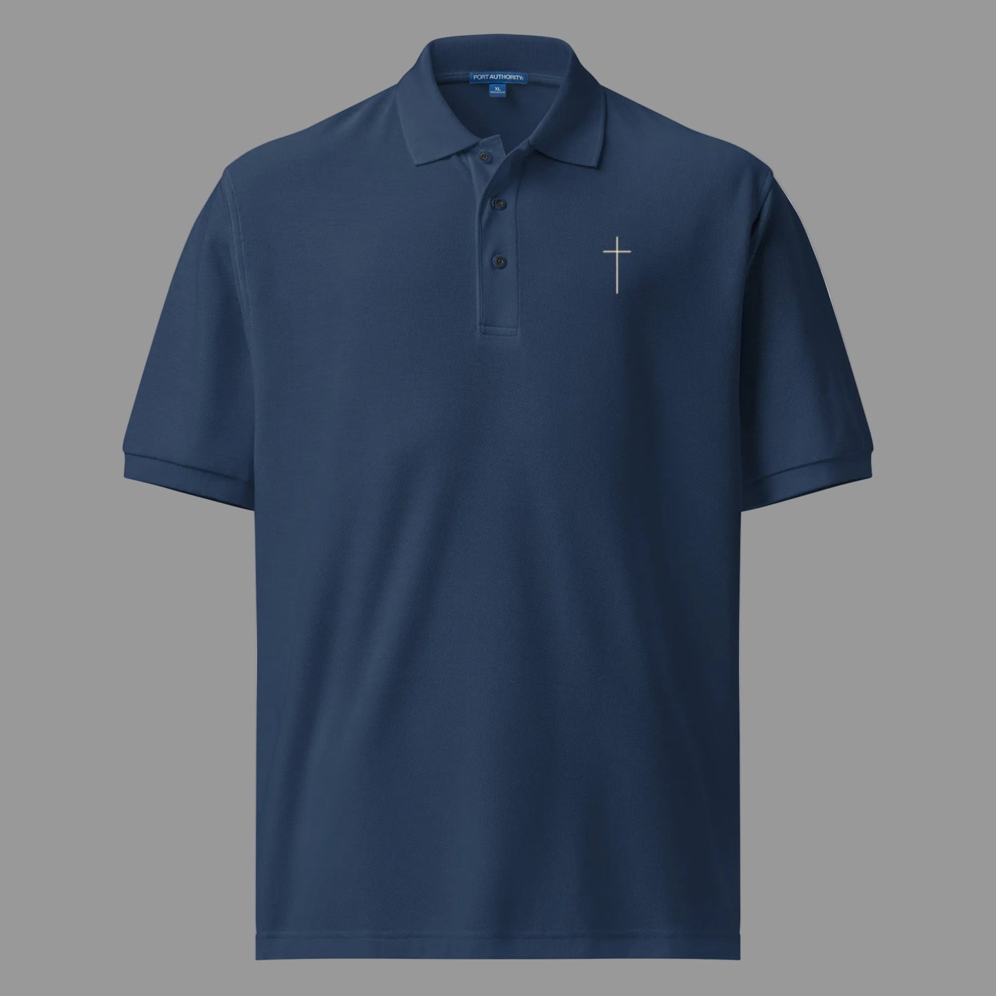 Front of Truth Matters Hebrews 13:8 polo in navy, small cross stitched on the left chest