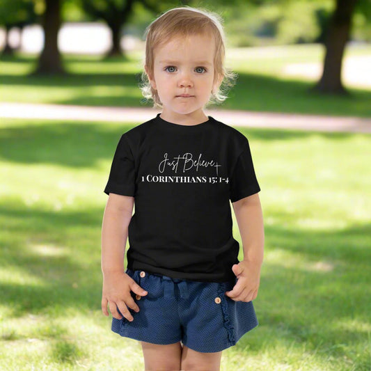 Truth Matters’ 1 Corinthians 15:1-4 Toddler T-Shirt with ‘Just Believe’ cross design.