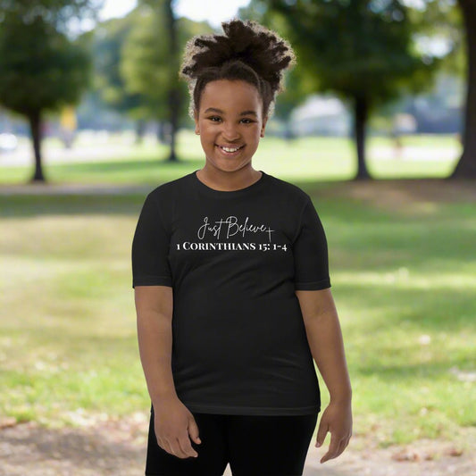 Truth Matters’ 1 Corinthians 15:1-4 Youth T-Shirt with ‘Just Believe’ cross design.
