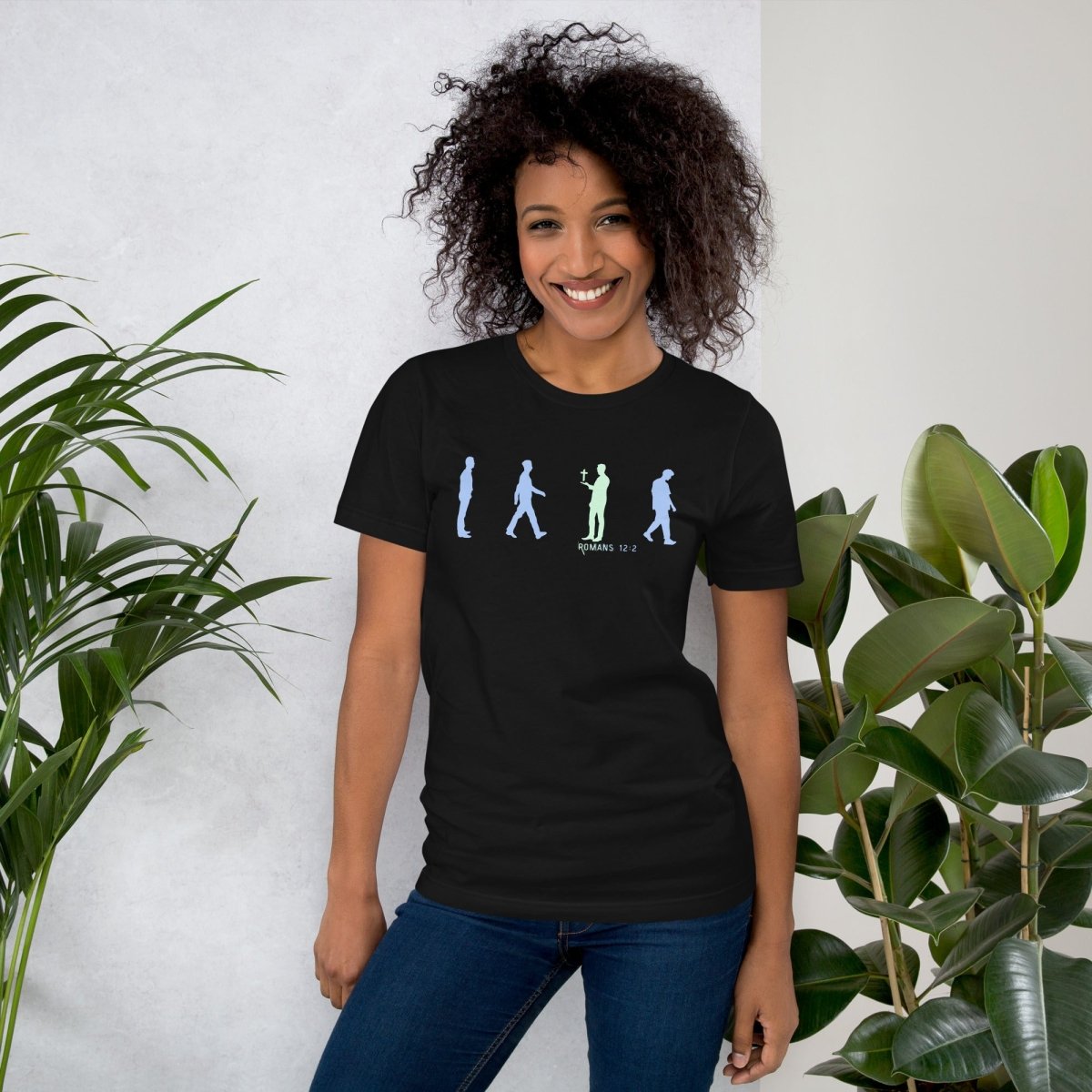 Truth Matters Romans 12:2 T-Shirt front with “Be Not Conformed” silhouette design, small cross, and clean typography in Black
