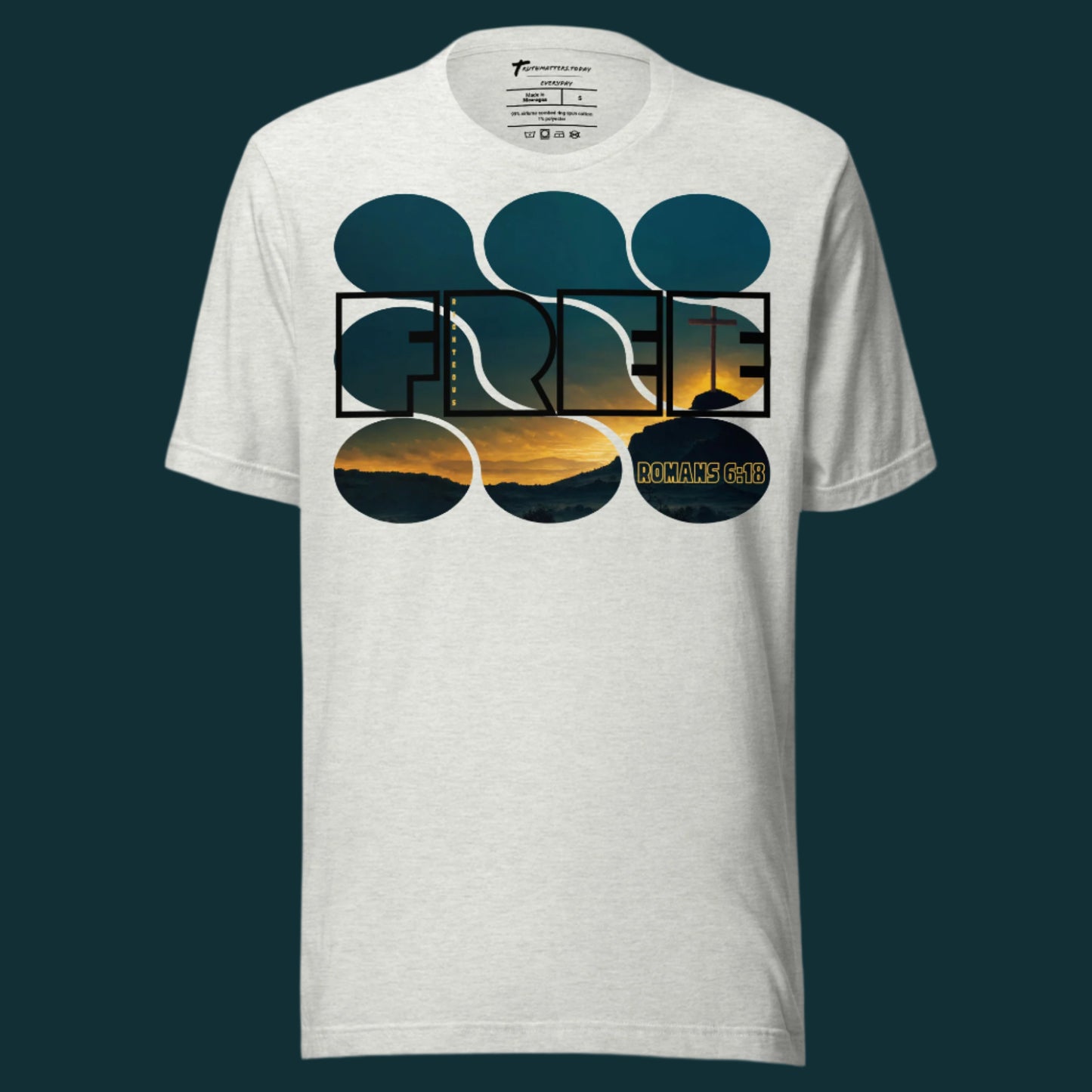 Truth Matters’ Romans 6:18 T-Shirt front with ‘FREE’, ‘Righteous’, and sunset cross on soft cotton in Ash.
