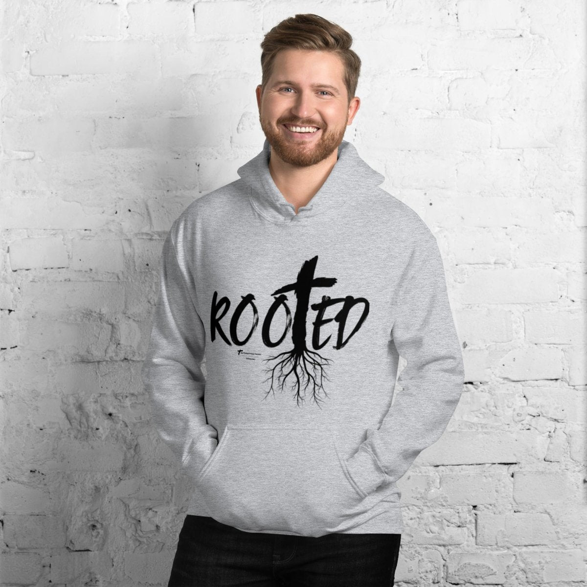 Front view of Truth Matters Rooted in Christ Hoodie with cross and tree roots in ‘ROOTED’ on soft cotton-poly blend in gray.