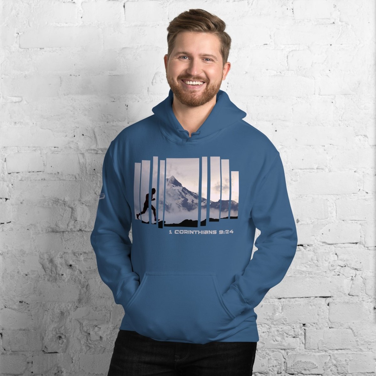 Man wearing Truth Matters Run the Race 1 Corinthians 9:24 Hoodie front with runner image and Smoky Mountains