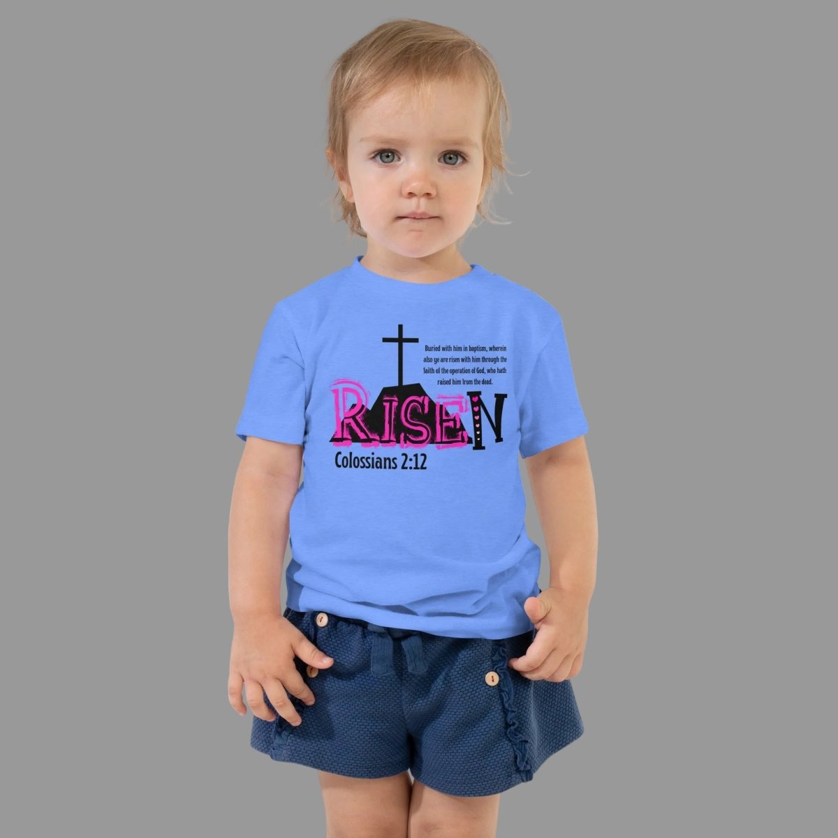 Toddler wearing RISEN Colossians 2:12 t-shirt, relaxed fit 100% cotton Christian faith apparel for kids