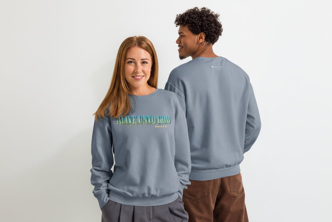 Person wearing Alive Unto God Romans 6 crewneck sweatshirt, soft cotton vintage Christian apparel for everyday faith wear